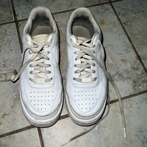 Worn out Nike Air Force platform shoe